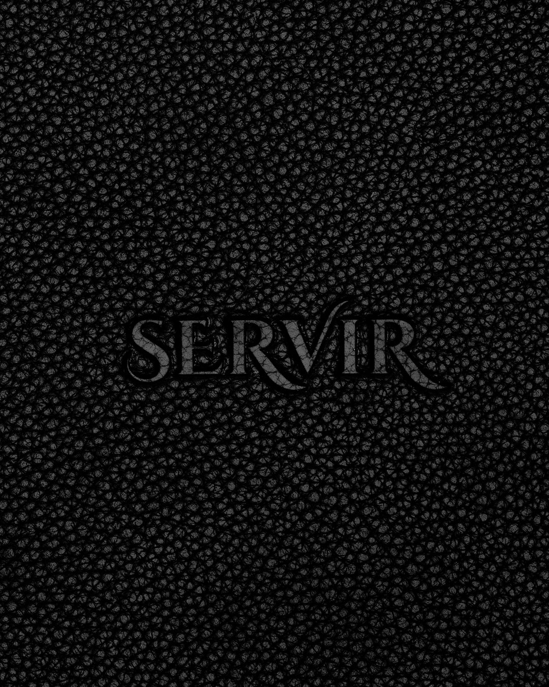 Debossed SERVIR logo on black recycled leather — SERVIR brand mark detail