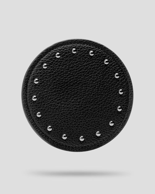 Black recycled leather coaster with silver dome studs, front view — SERVIR First Service set of 4
